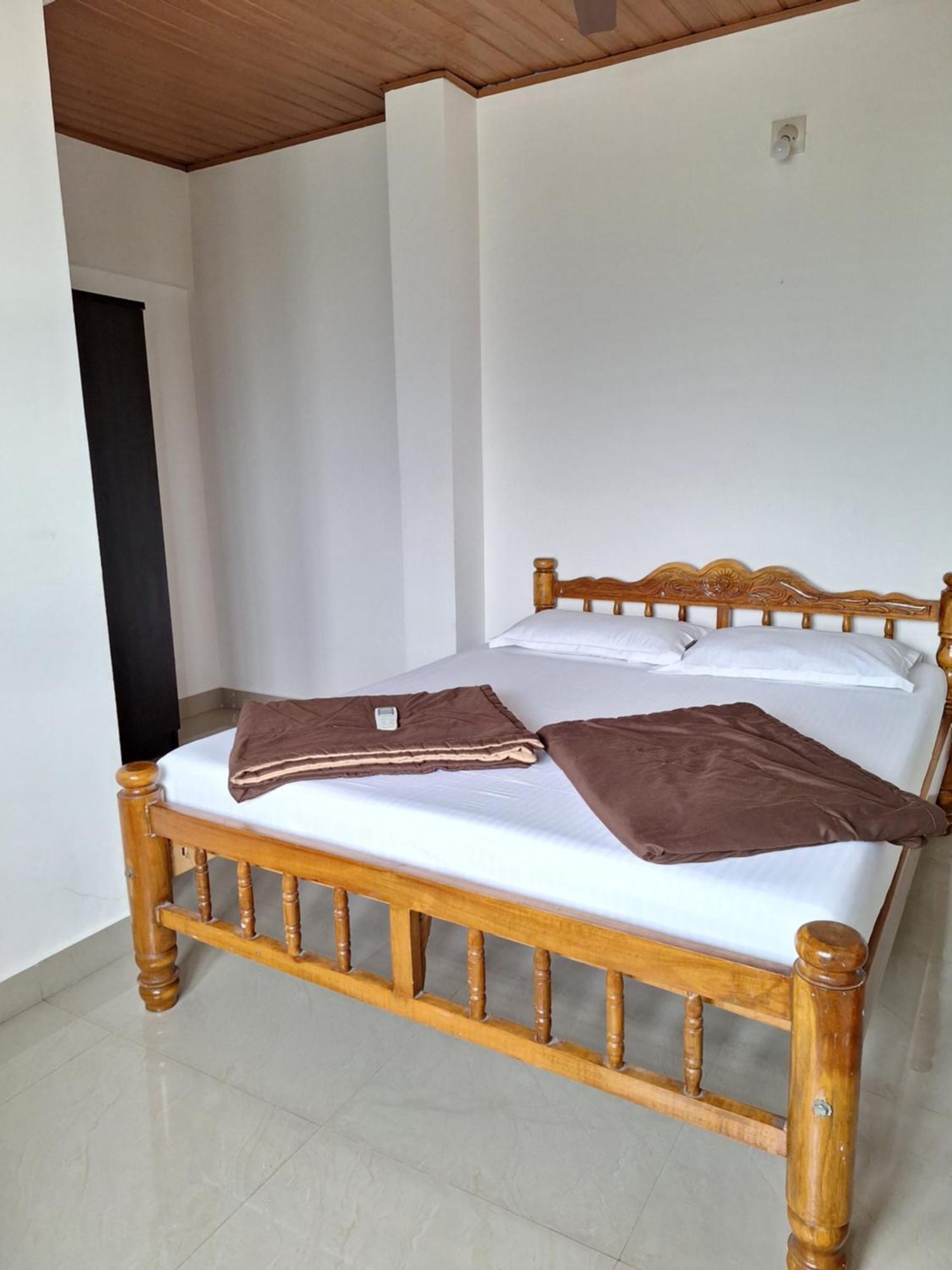 Suvarna Grande Homes Mangalore Chambre photo